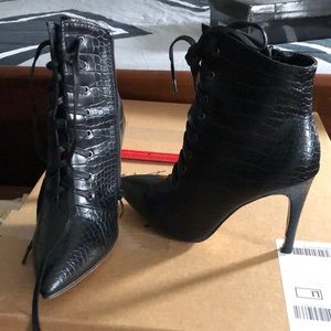 Black heeled booties.